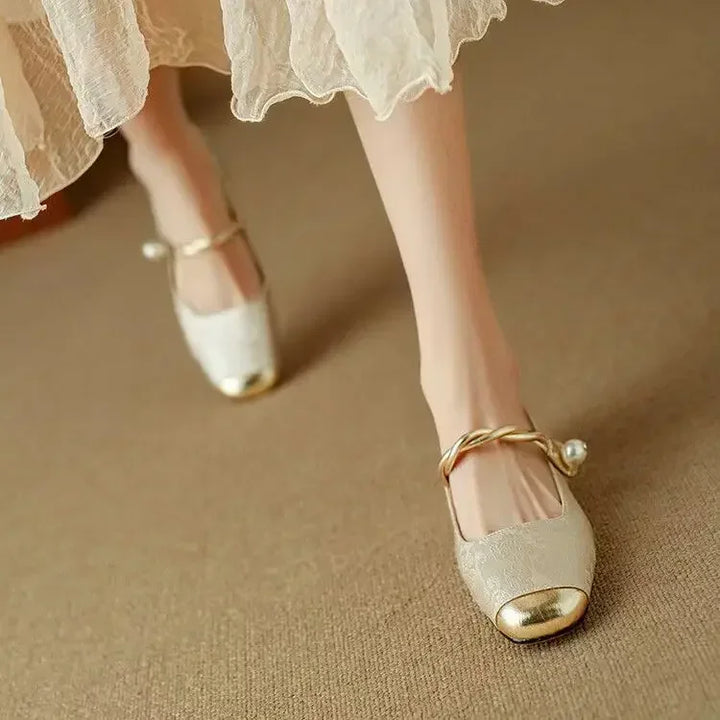 Elegant women's vintage pearl strap Mary Jane shoes, perfect for parties & formal events.
