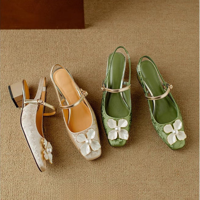 Occasion-ready floral jacquard block-heel pumps. Elegant dress shoes with a comfortable block heel.