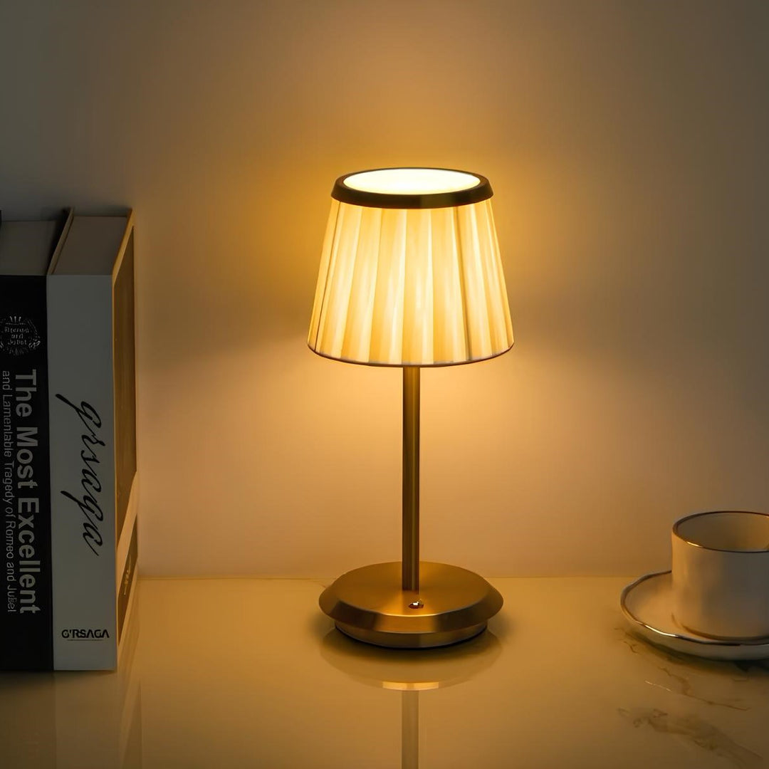 Luxurious Classic Elegance fabric shade table lamp with solid gold brass base. Rechargeable, modern dimmable LED lighting.