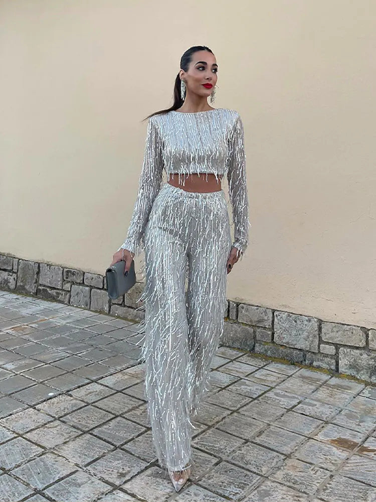 Elegant women's sequin two-piece set, designed for a shimmering and eye-catching party look.