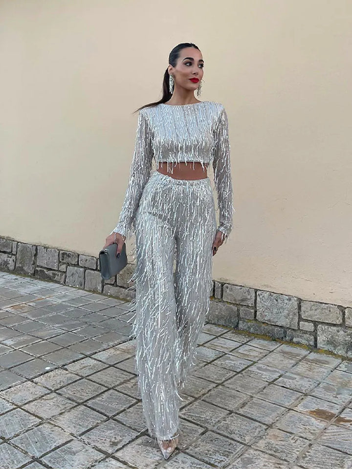 Elegant women's sequin two-piece set, designed for a shimmering and eye-catching party look.