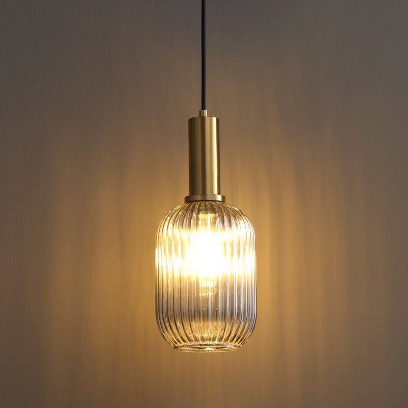 Decorative glass pendant fixture, enhancing retro and vintage home decor.
