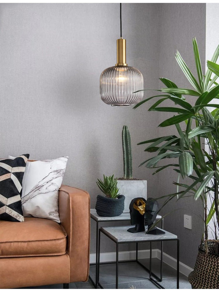 Classic retro glass pendant light, perfect for ambient interior lighting.