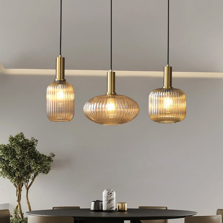 Elegant retro glass pendant light fixture for sophisticated home decor.