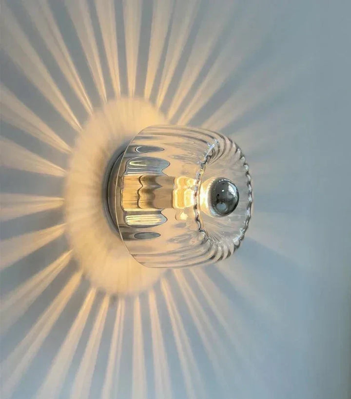 Modern Bauhaus wall sconce, elegant home lighting fixture featuring sleek metal and glass design.