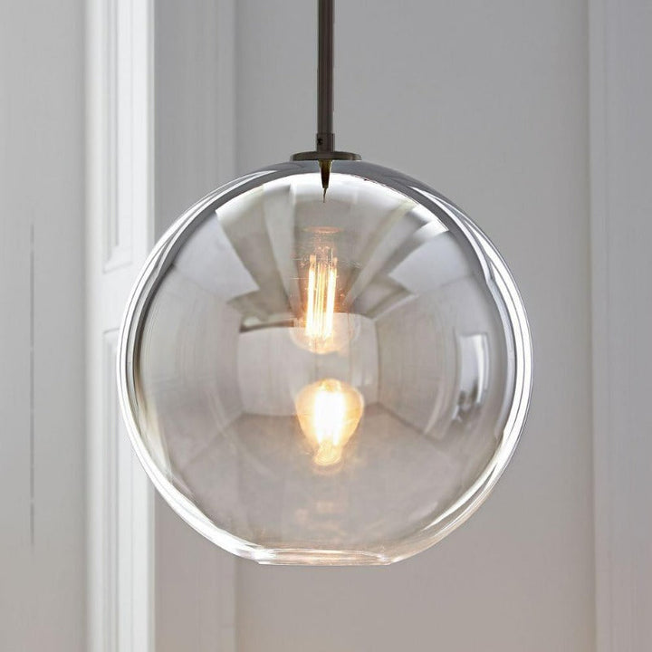 Black modern glass ball pendant light, an elegant ceiling fixture perfect for bedrooms.