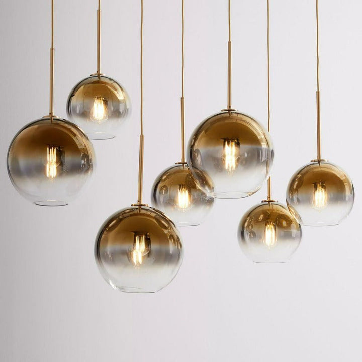 Elegant glass ball pendant light with modern design, ideal indoor lighting for any room.