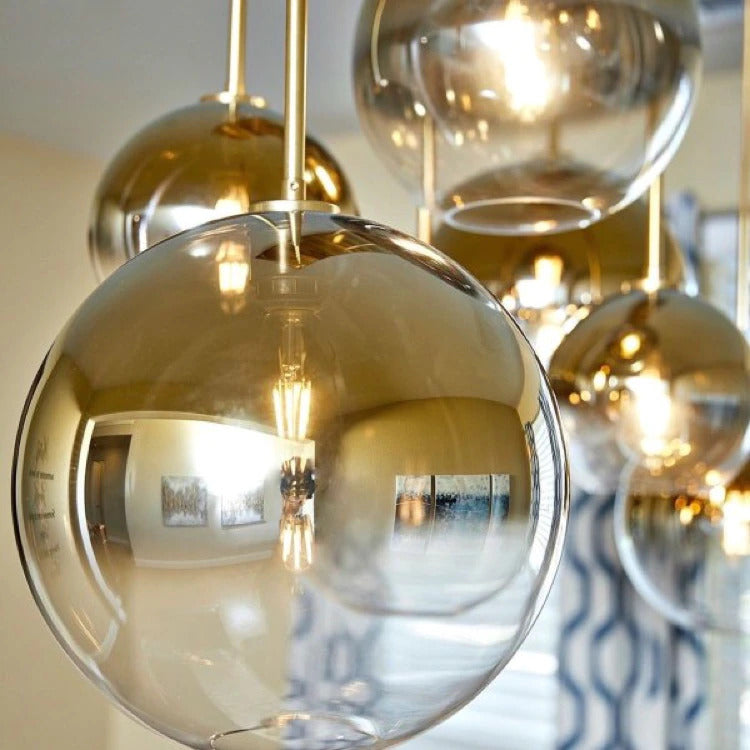 Silver gradient glass pendant light, a modern ceiling fixture for contemporary bedroom decor.