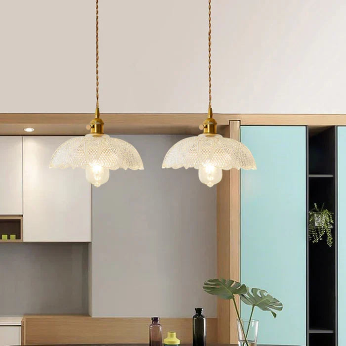 Stylish OpulentGlow glass pendant, a focal point for modern kitchen lighting.