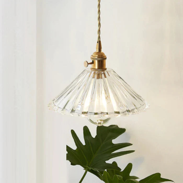 Contemporary transparent glass hanging fixture, ideal for elegant interiors.
