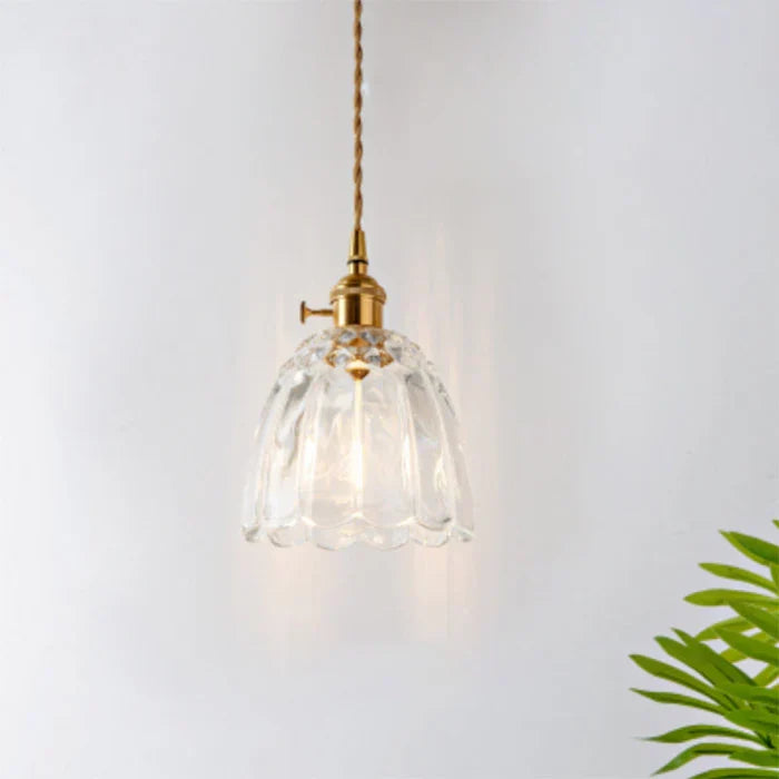 Chic modern glass pendant, ideal for dining room lighting and home decor.