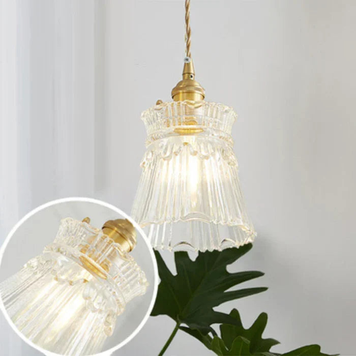 OpulentGlow elegant transparent glass pendant lamp for a minimalist aesthetic.
