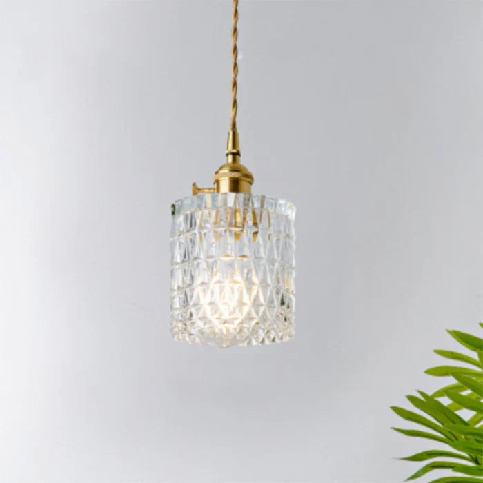 OpulentGlow modern pendant light with clear glass, industrial style appeal.