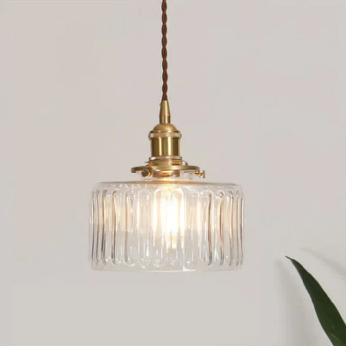 Transparent glass pendant light, a chic ceiling fixture for modern homes.