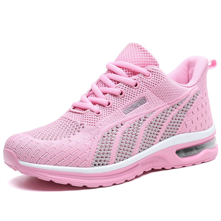 Women's GlideMotion ergonomic running trainers with cushioned heel for comfortable support during runs and daily wear.