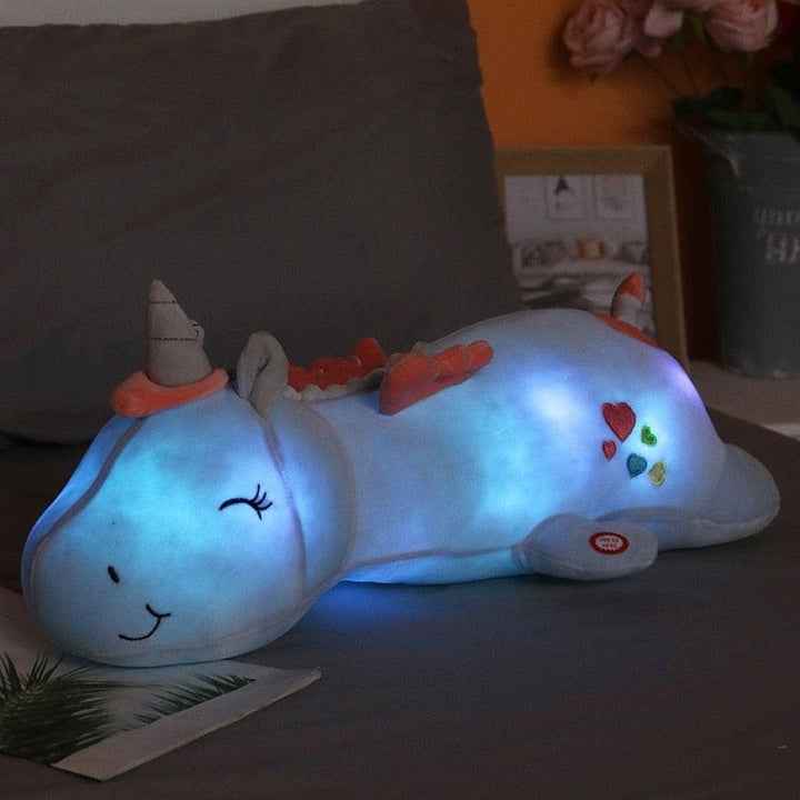 Plush unicorn toy featuring integrated rainbow LED lights, a super soft glowing friend for children's gifts.