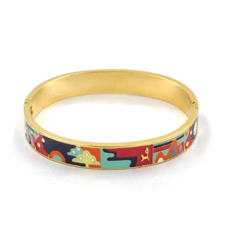 Beautiful geode & gold charm cuff bracelet for women. Stylish natural stone fashion accessory.