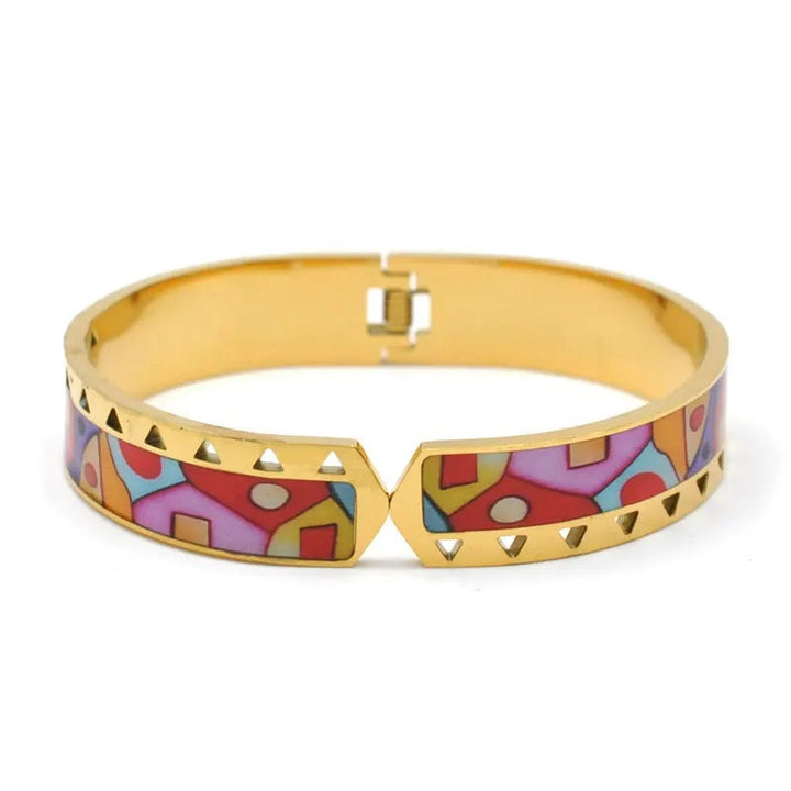Women's adjustable gold cuff bracelet with a unique geode and elegant charm, a chic accessory.