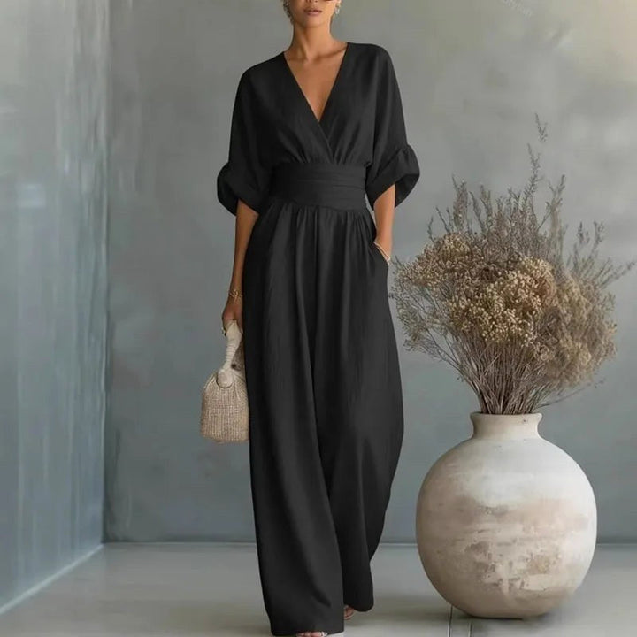 Chic women's wide-leg V-neck jumpsuit featuring a wrap front, a key piece for spring fashion and comfort.