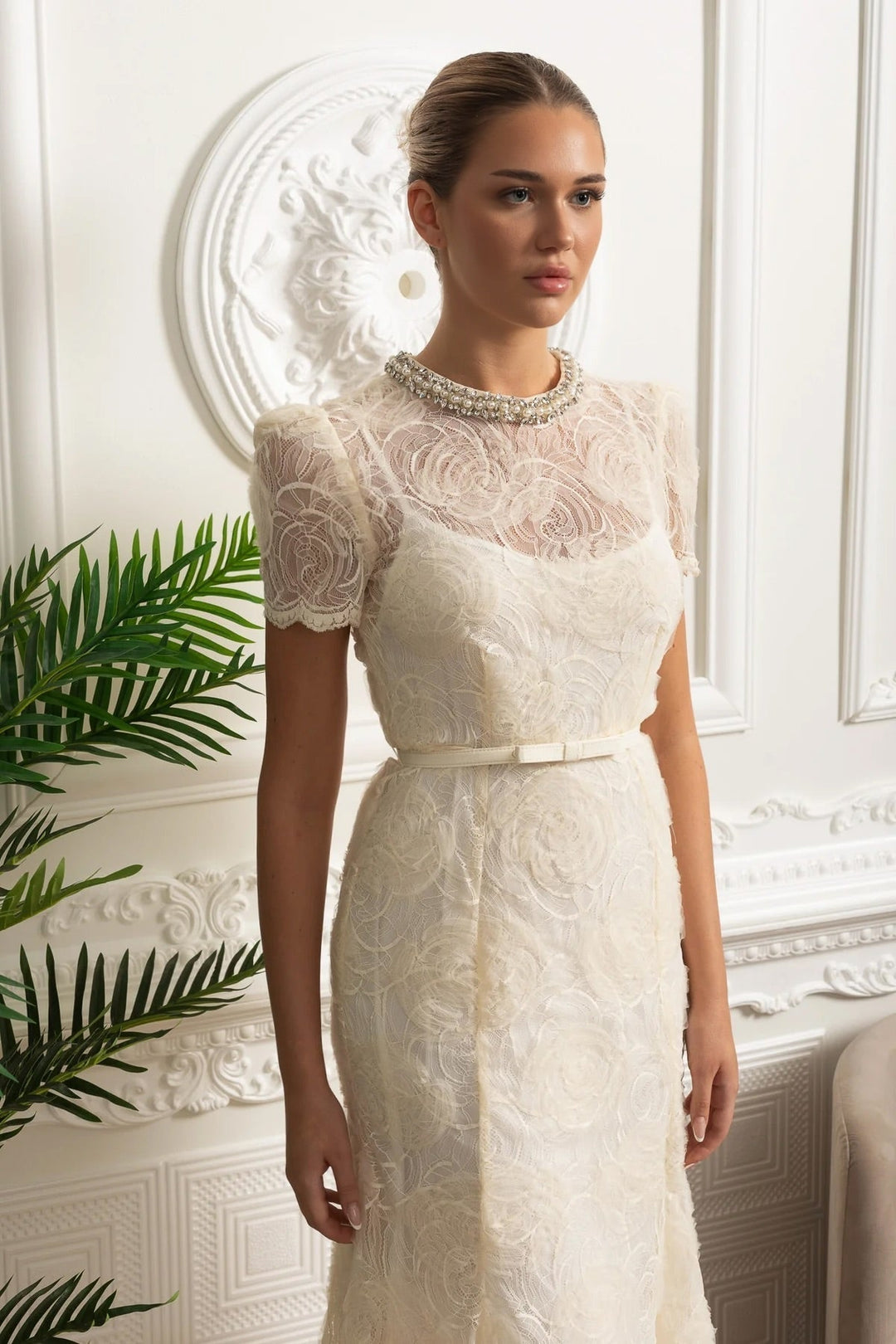 Beautiful women's elegant midi dress featuring a flattering belt, perfect for formal events and races.