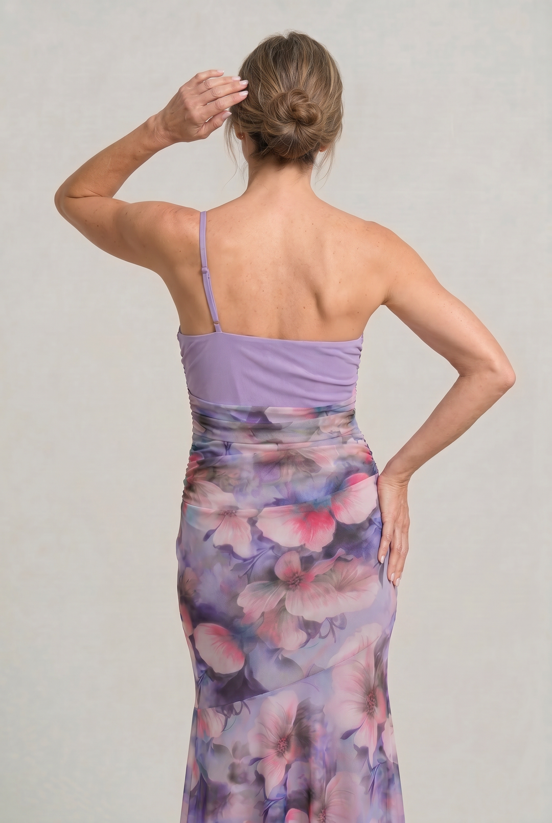 Chic pink floral one shoulder asymmetric cocktail dress. Flattering design for parties.
