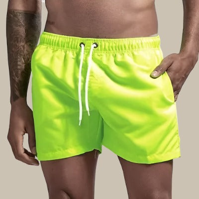 Men's summer fashion quick-dry swim shorts. Comfortable drawstring casual shorts for vacation.