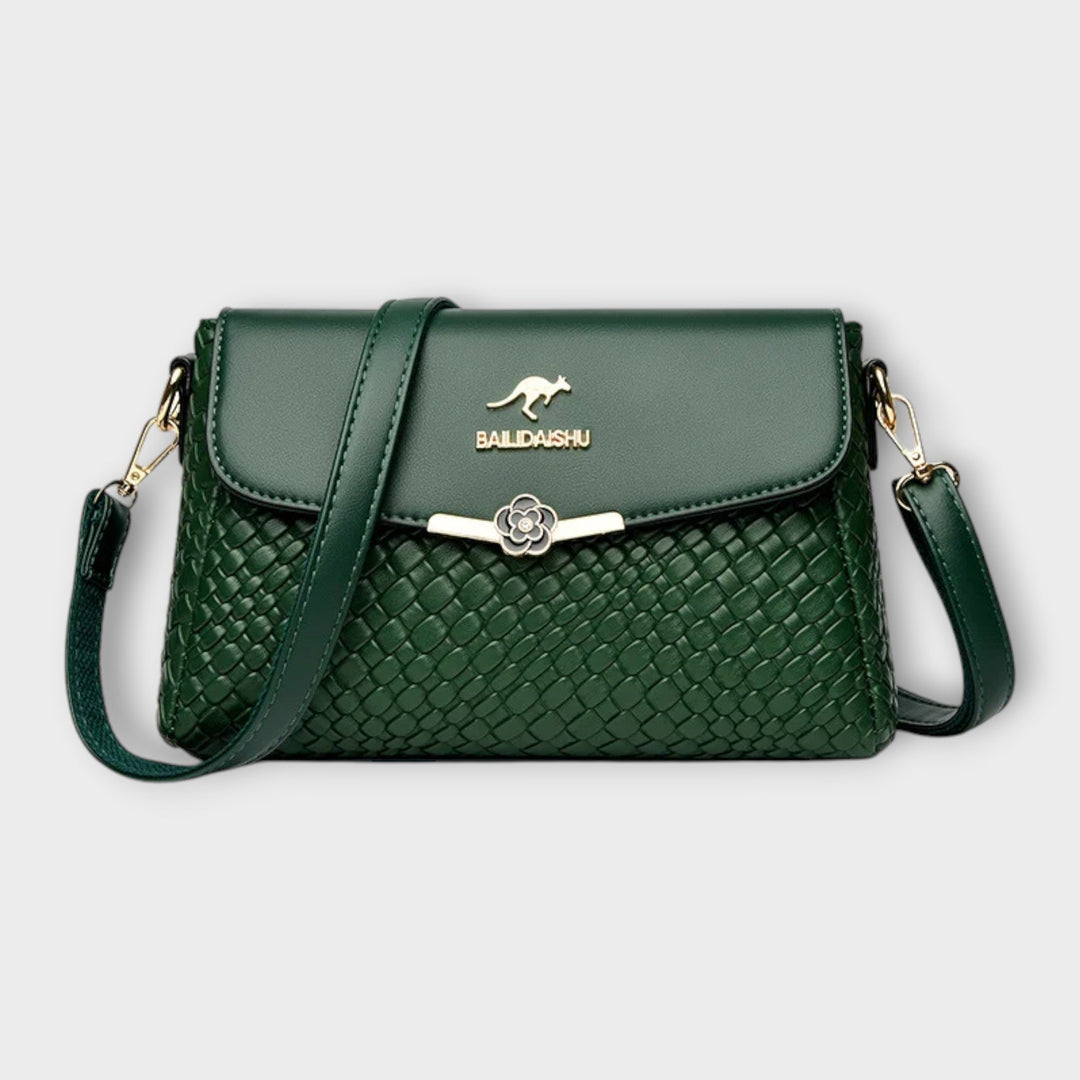 Versatile green women's shoulder bag, a practical yet elegant handbag and fashion accessory for everyday.