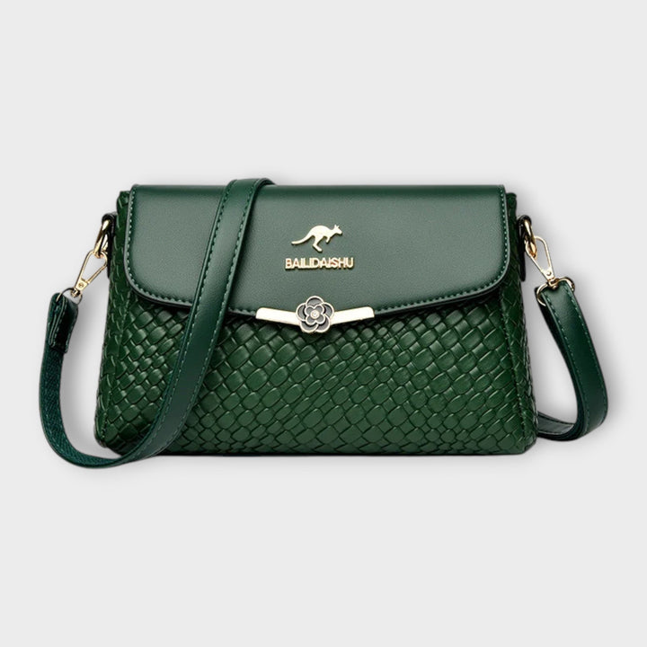 Versatile green women's shoulder bag, a practical yet elegant handbag and fashion accessory for everyday.