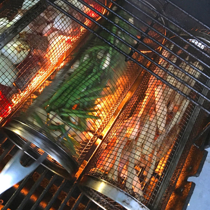 Stainless steel rotating grill basket, essential for even grilling of vegetables & small items on any BBQ or smoker.