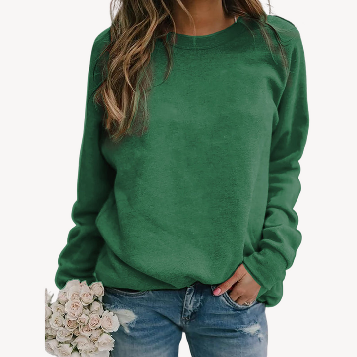 Relaxed fit women's crew neck pullover sweatshirt, an essential comfortable long sleeve top.