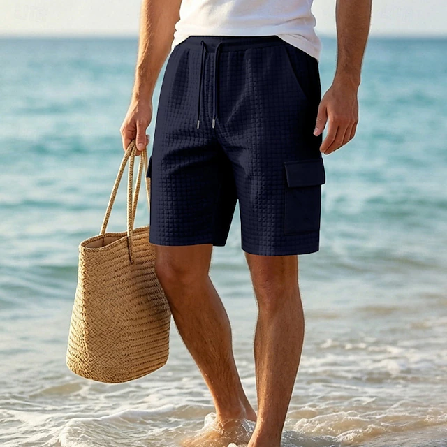 Stylish men's relaxed fit cargo shorts, perfect for summer fashion, featuring ample pockets and a comfortable design.