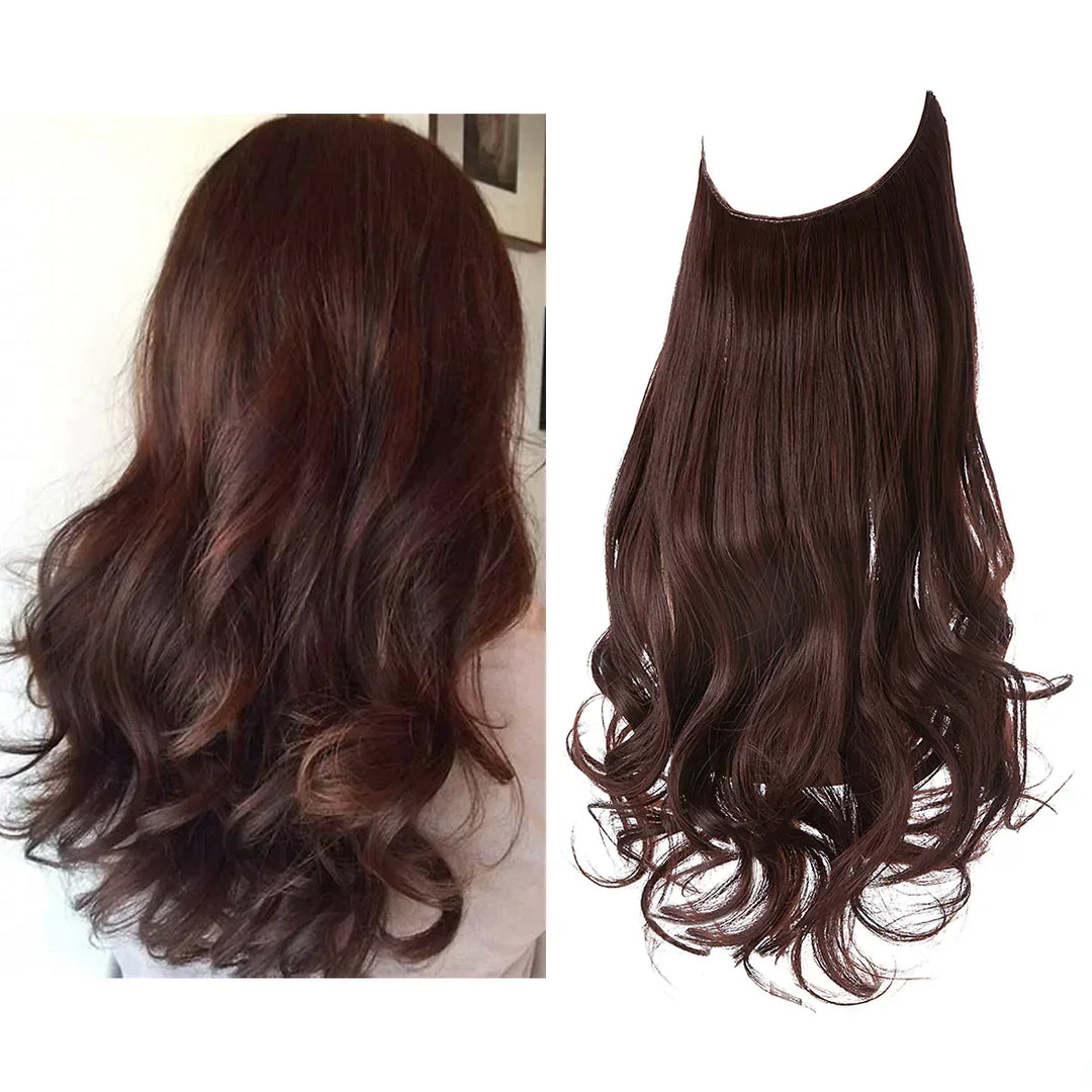 Close-up of soft natural wave clip-in hair extensions. Perfect for instant volume & length.