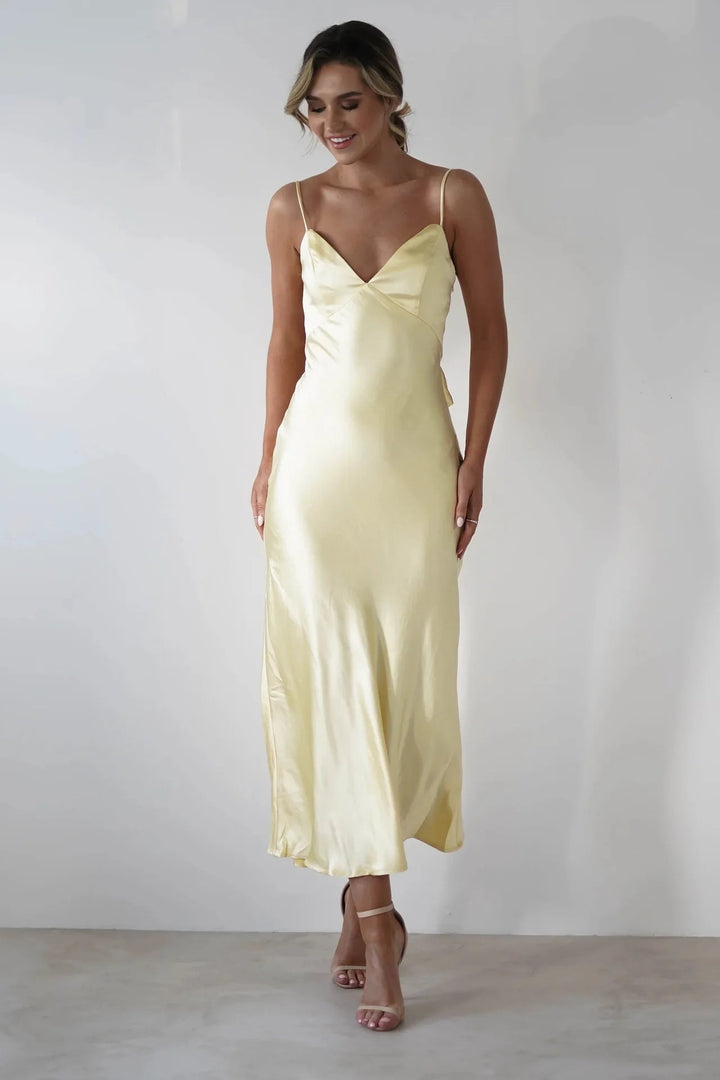 Graceful women's V-neck midi dress, perfect for formal events & special occasions. Elegant wedding guest attire.