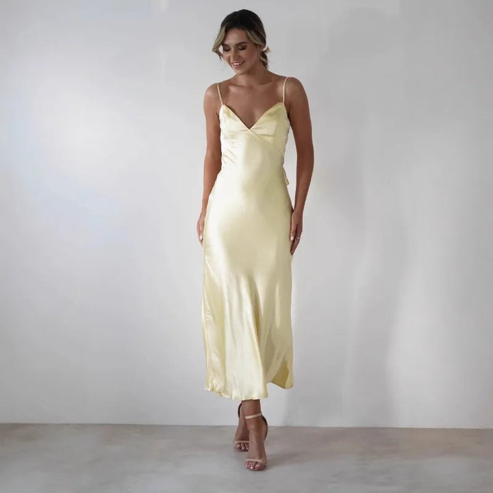 Beautiful V-neck midi dress, a graceful choice for special occasions, formal events & evening wear.