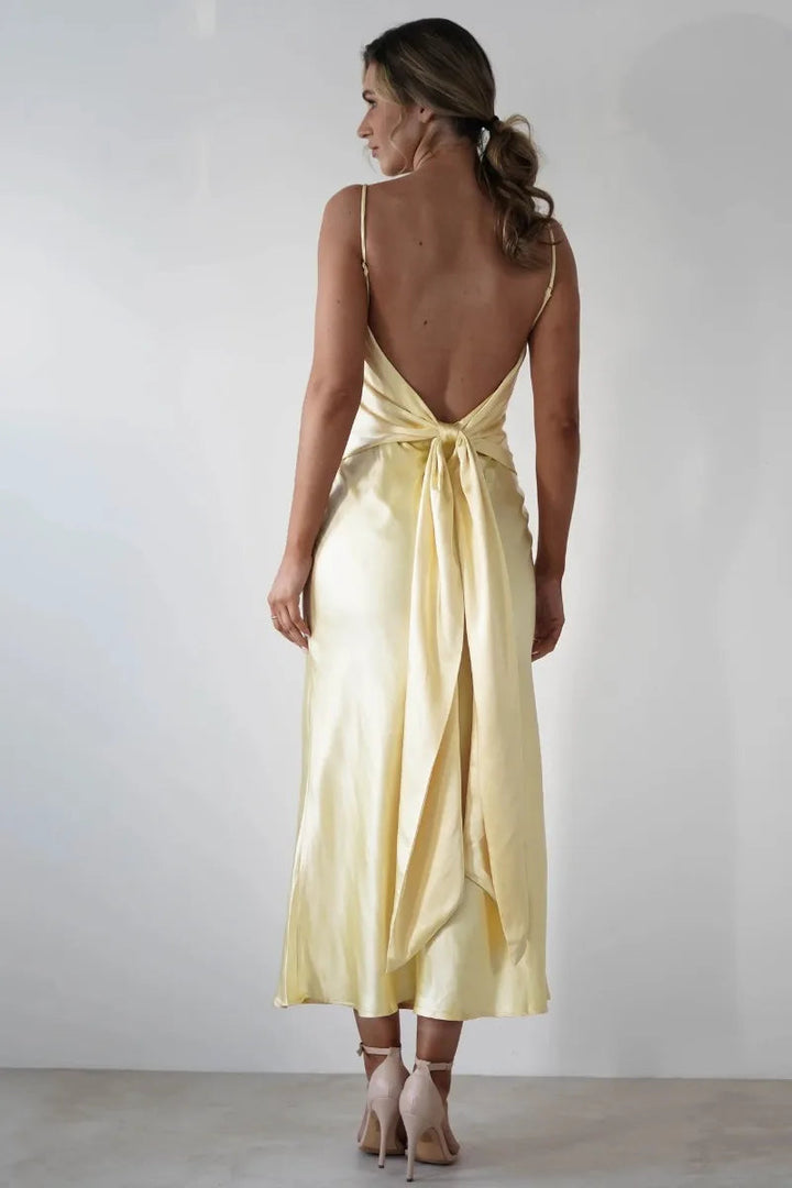Women's elegant V-neck midi dress. Perfect for cocktail parties, formal occasions & wedding guests.