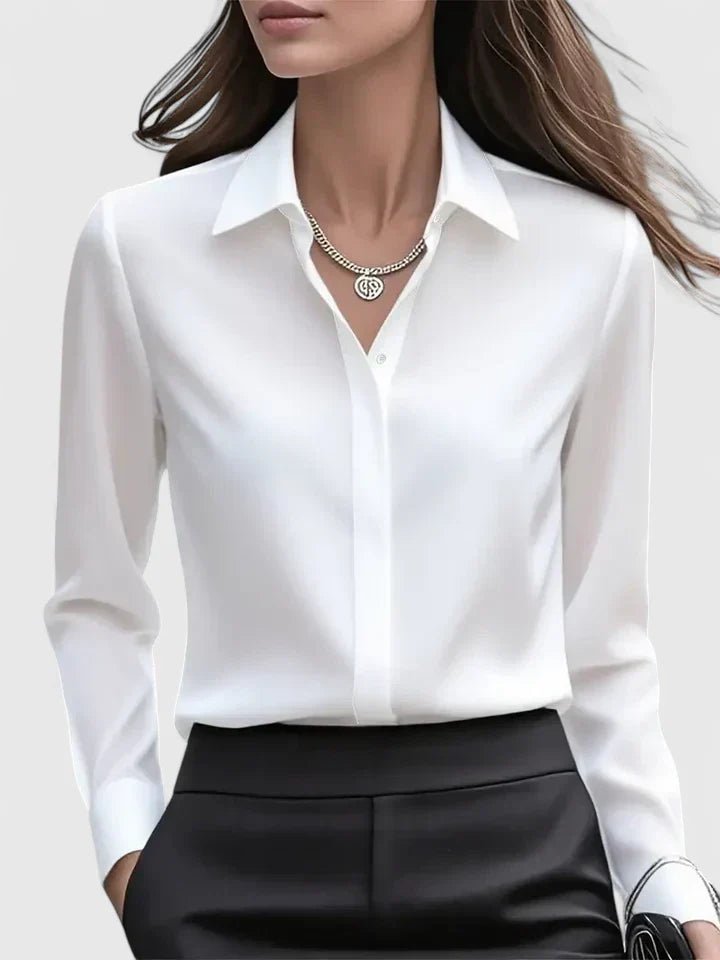 White tailored long-sleeve blouse for women, featuring a sophisticated concealed button placket.