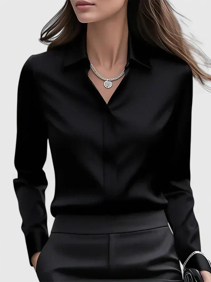 Black women's long-sleeve blouse with concealed placket, perfect for office wear & professional looks.