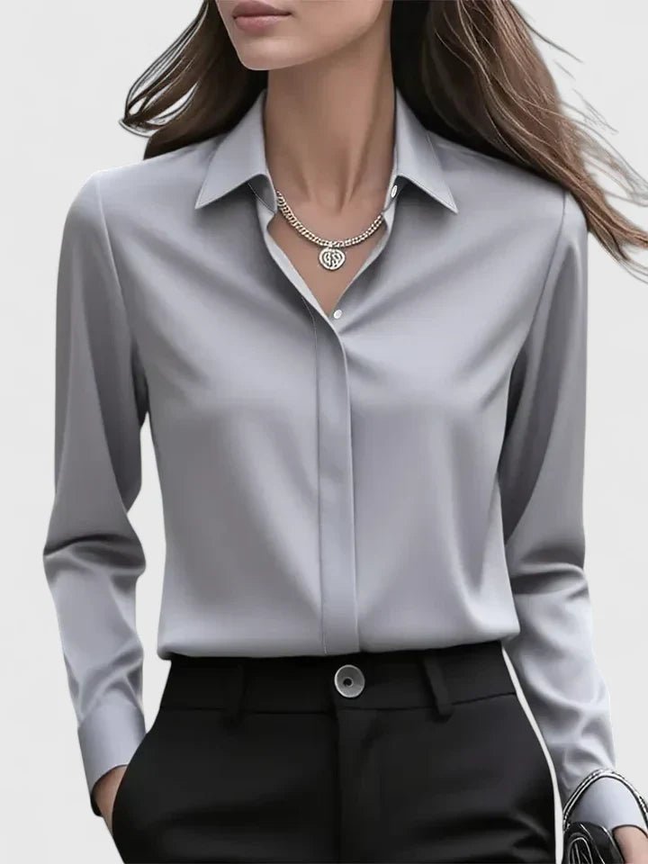 Gray stylish long-sleeve blouse for women, featuring a classic concealed button placket detail.
