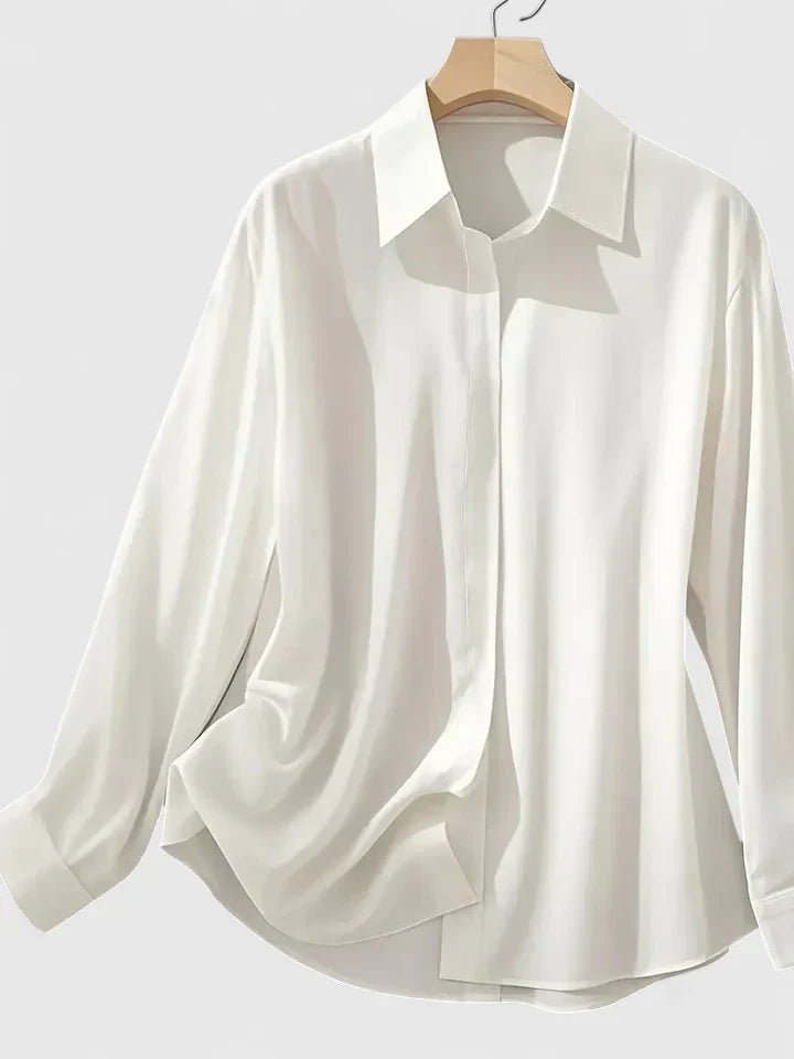 Elegant women's long-sleeve blouse with a concealed placket, ideal for professional office wear.