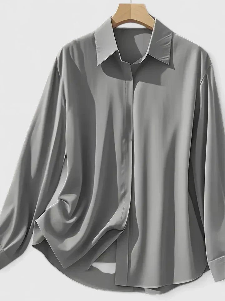 Versatile women's long-sleeve blouse, tailored with a concealed placket for stylish work or casual.