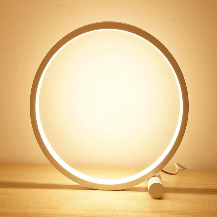 Ambient LED halo nightstand lamp by Nvroome Lights, dimmable & modern for bedroom or living room lighting.