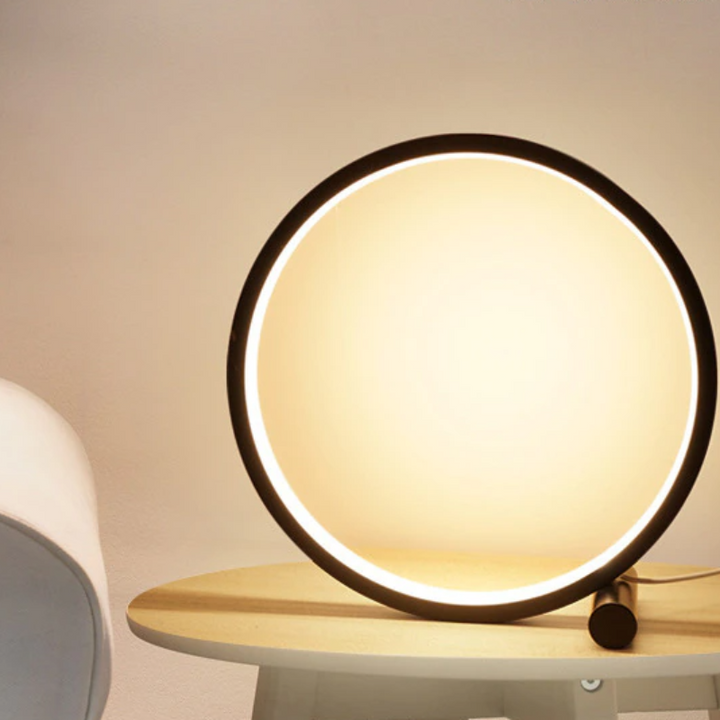 Dimmable LED halo lamp for modern decor, a minimalist nightstand light by Nvroome Lights for bedrooms.
