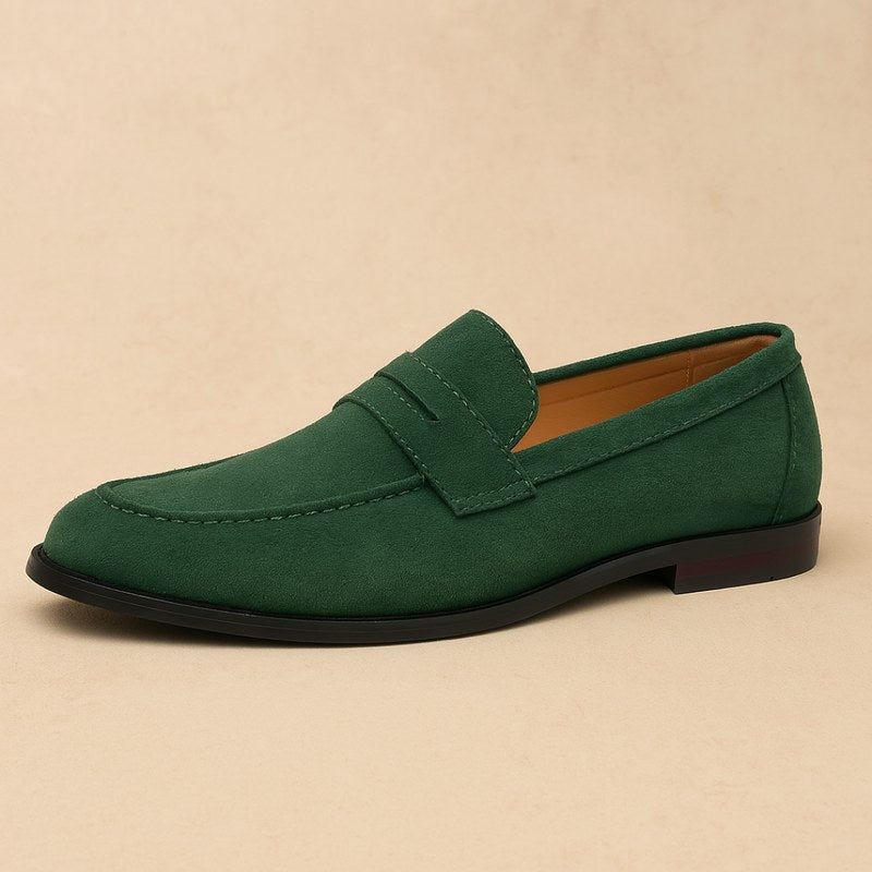 Sleek black leather slip-on loafers for men, showcasing modern design, comfort & classic elegance.