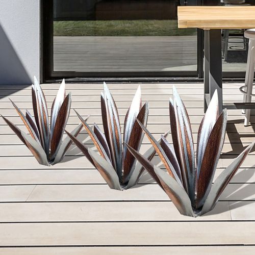 Handcrafted metal yard art sculpture, rust-proof. Versatile indoor & outdoor decor accent.