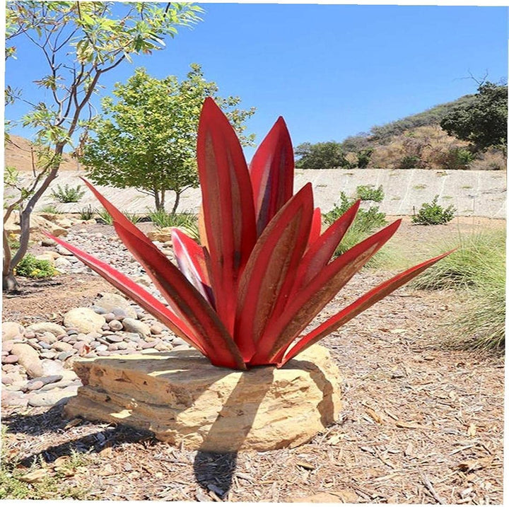 Modern rust-proof metal outdoor sculpture. Stylish and weather resistant garden decor accent.