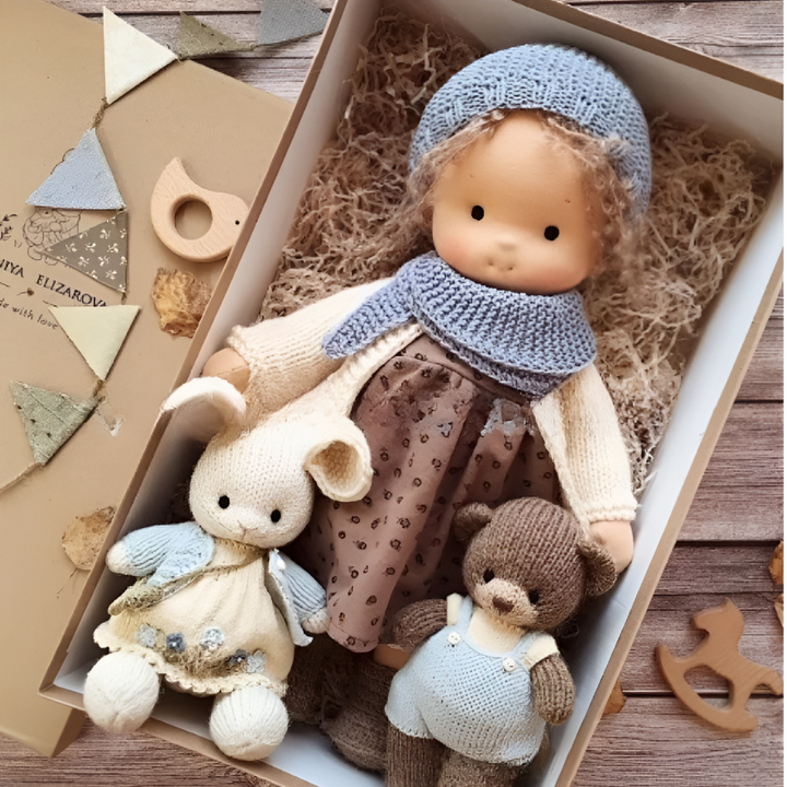 The texture of the cotton fabric on this Waldorf cuddly doll is inviting and soft.