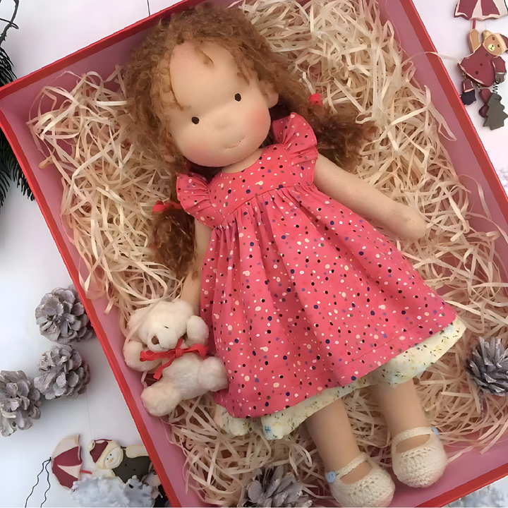 Toddler's delight with a handmade Waldorf cuddly toy, perfect for snuggles.