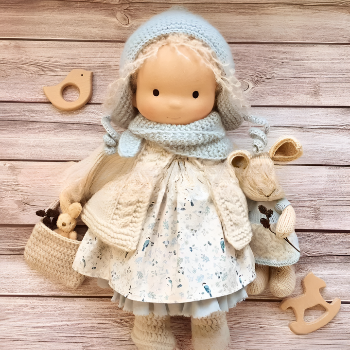 This natural cotton doll is a tactile and comforting Waldorf toy.