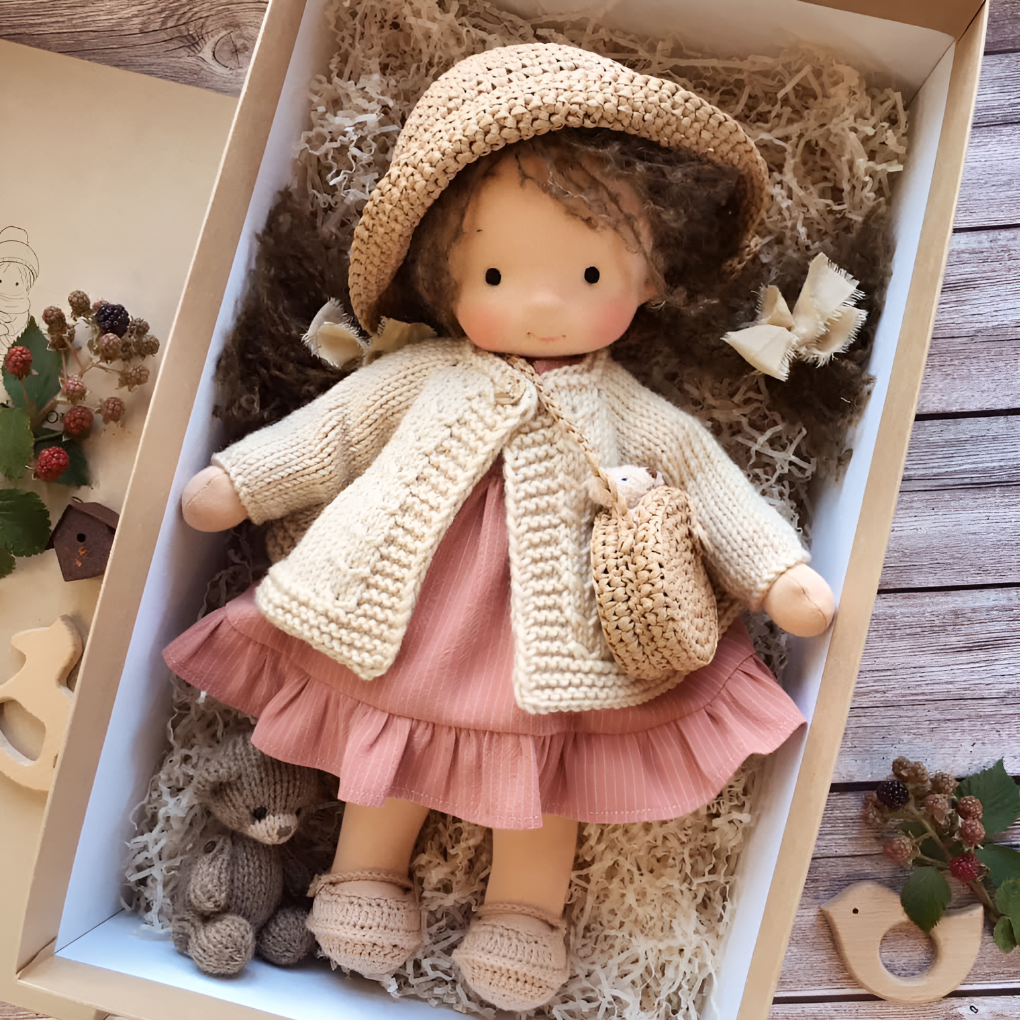 A huggable cotton Waldorf doll, perfect for little arms to hold.