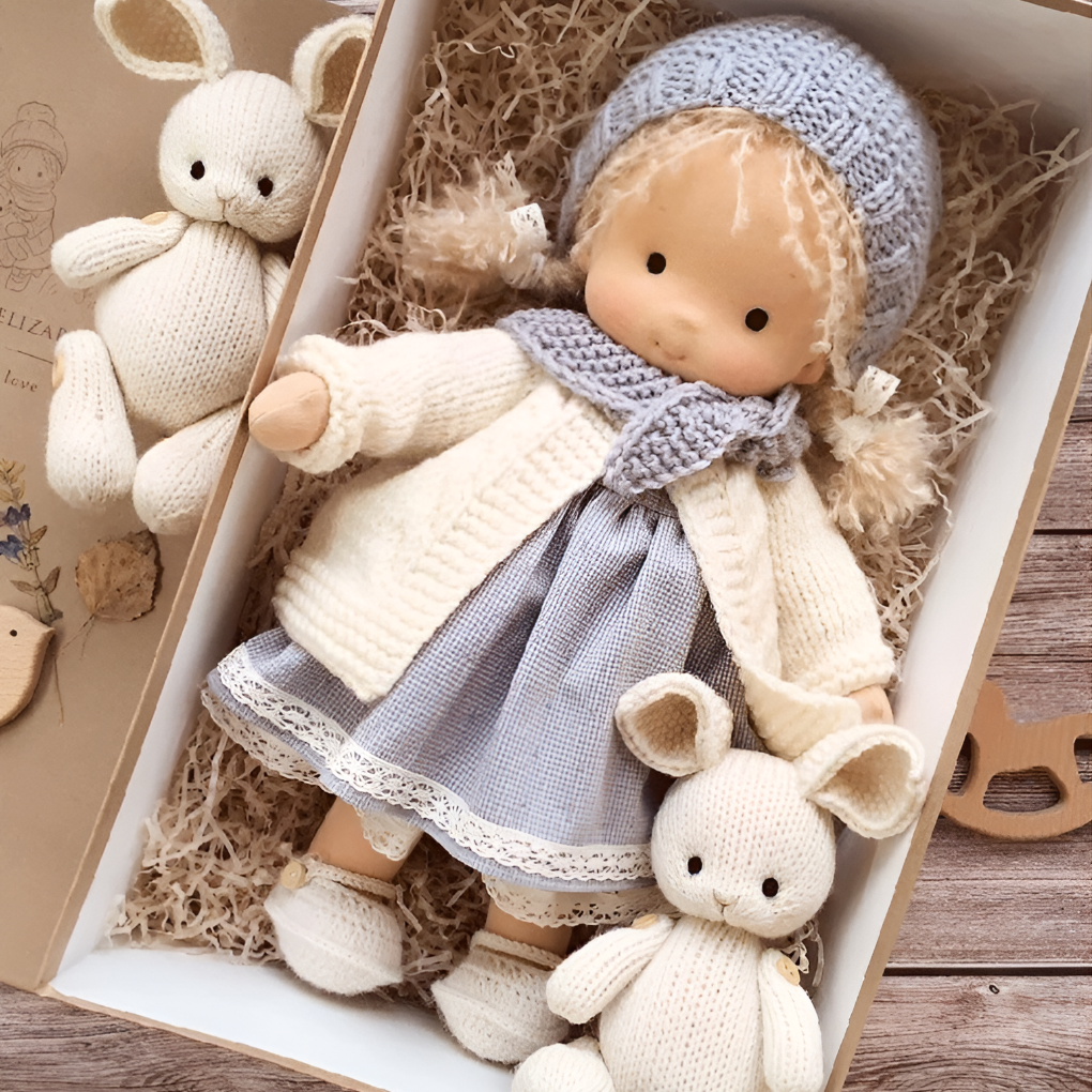 Close-up on the delicate stitching of a handmade Waldorf cuddly toy.